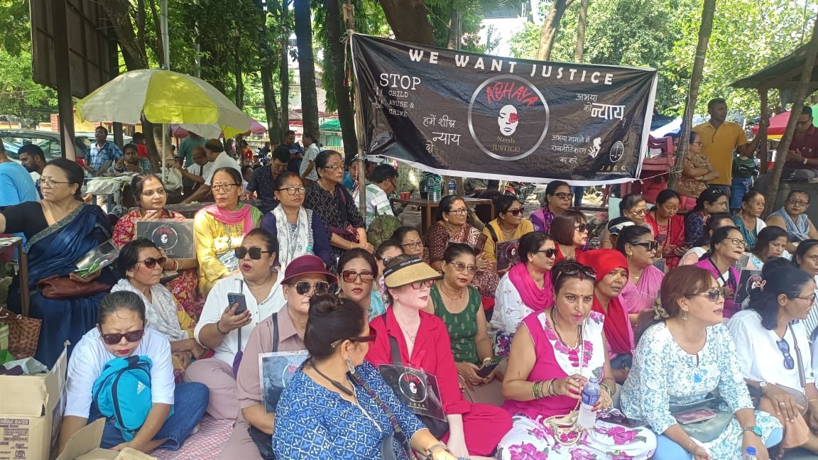 Women gathered for a community programme